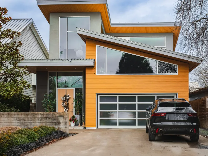Single-story home with a contemporary garage door