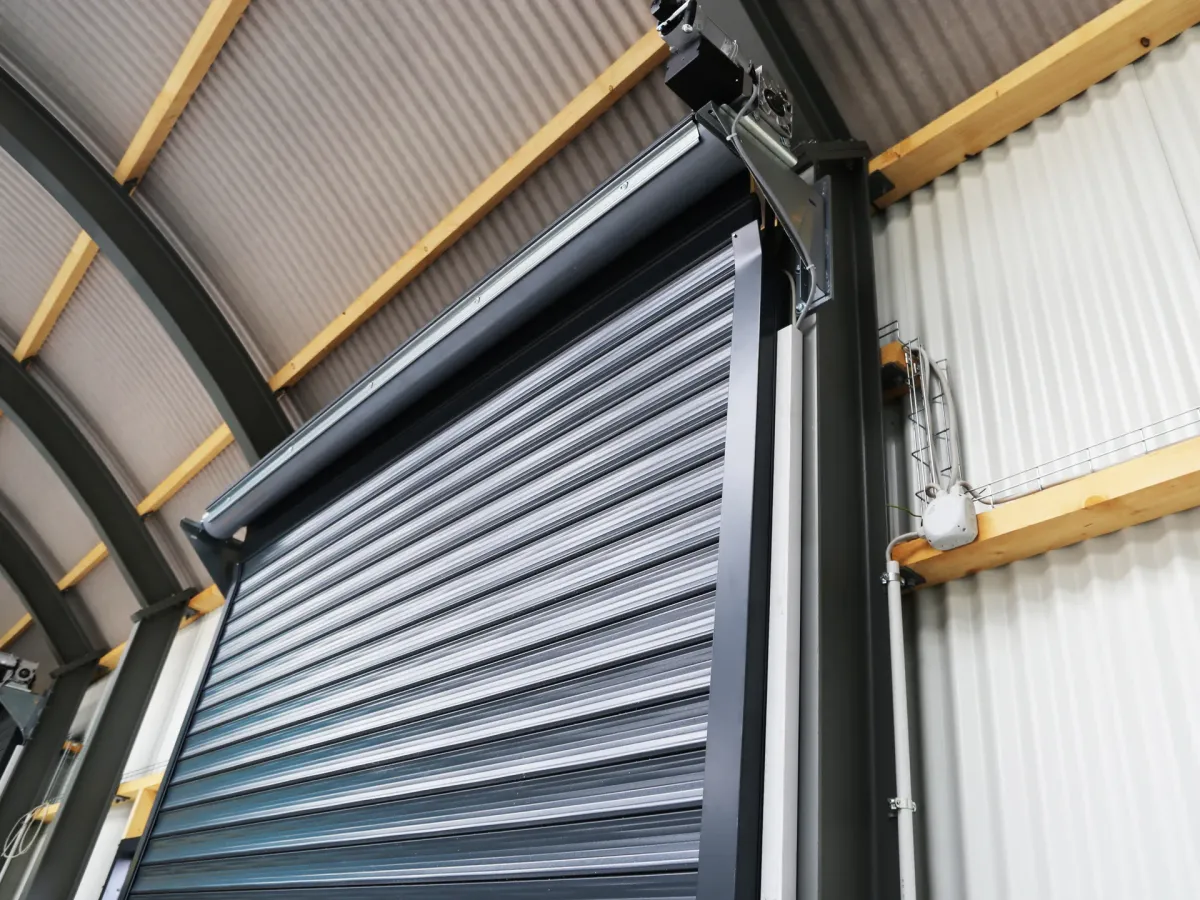 Open garage door showing the interior track and roller system